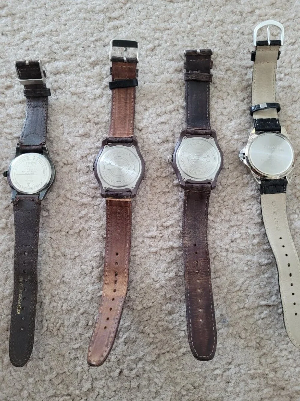 Four men's Timex watches with Indiglo in good condition